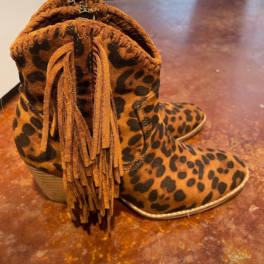 Cheetah print fringe booties.
